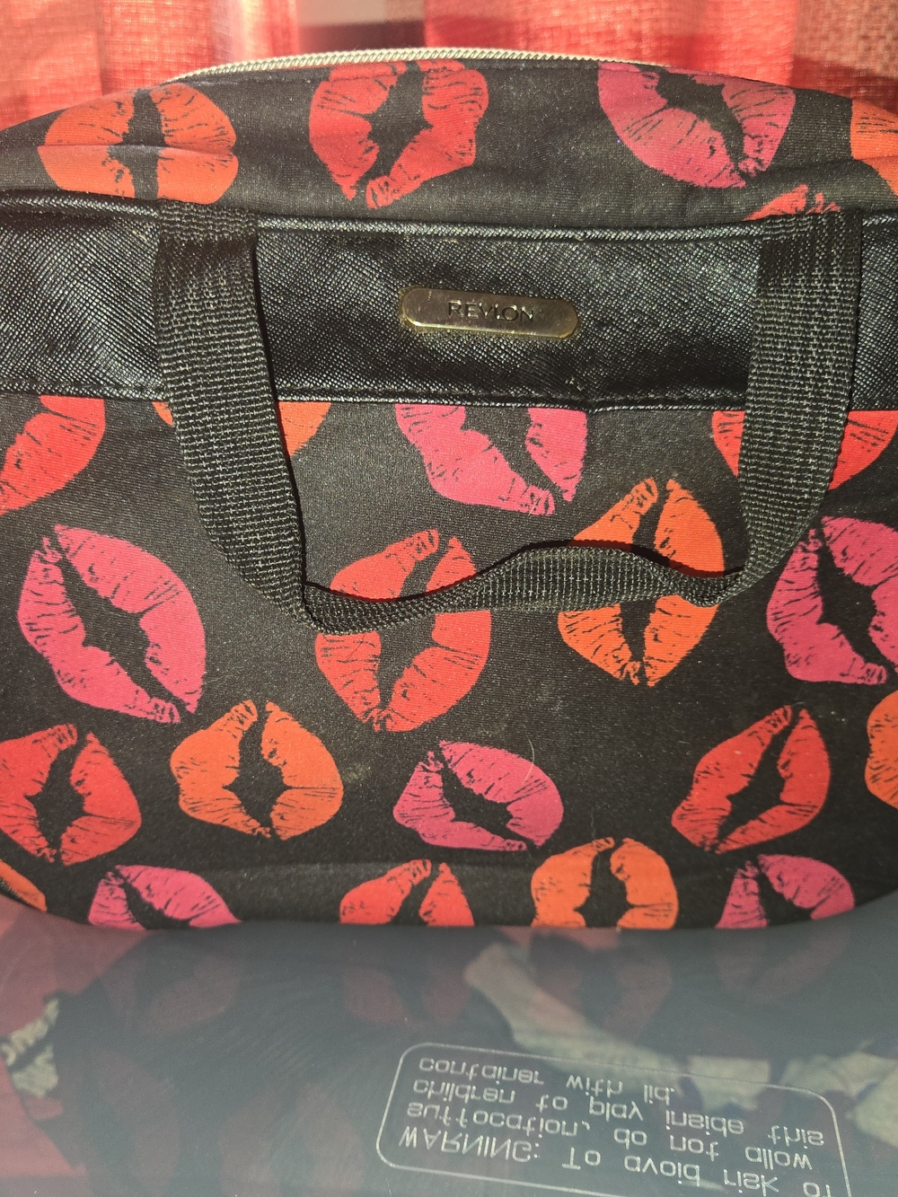 Revlon Women's Black Cosmetic Bag with Pink & Orange Lip Print